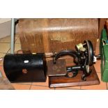 FOUR ANTIQUE SEWING MACHINES, three with cases, late nineteenth/early twentieth century,