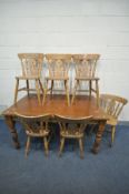 A PINE KITCHEN TABLE, on turned legs, length 152cm x depth 91cm x height 77cm, and six chairs (7)