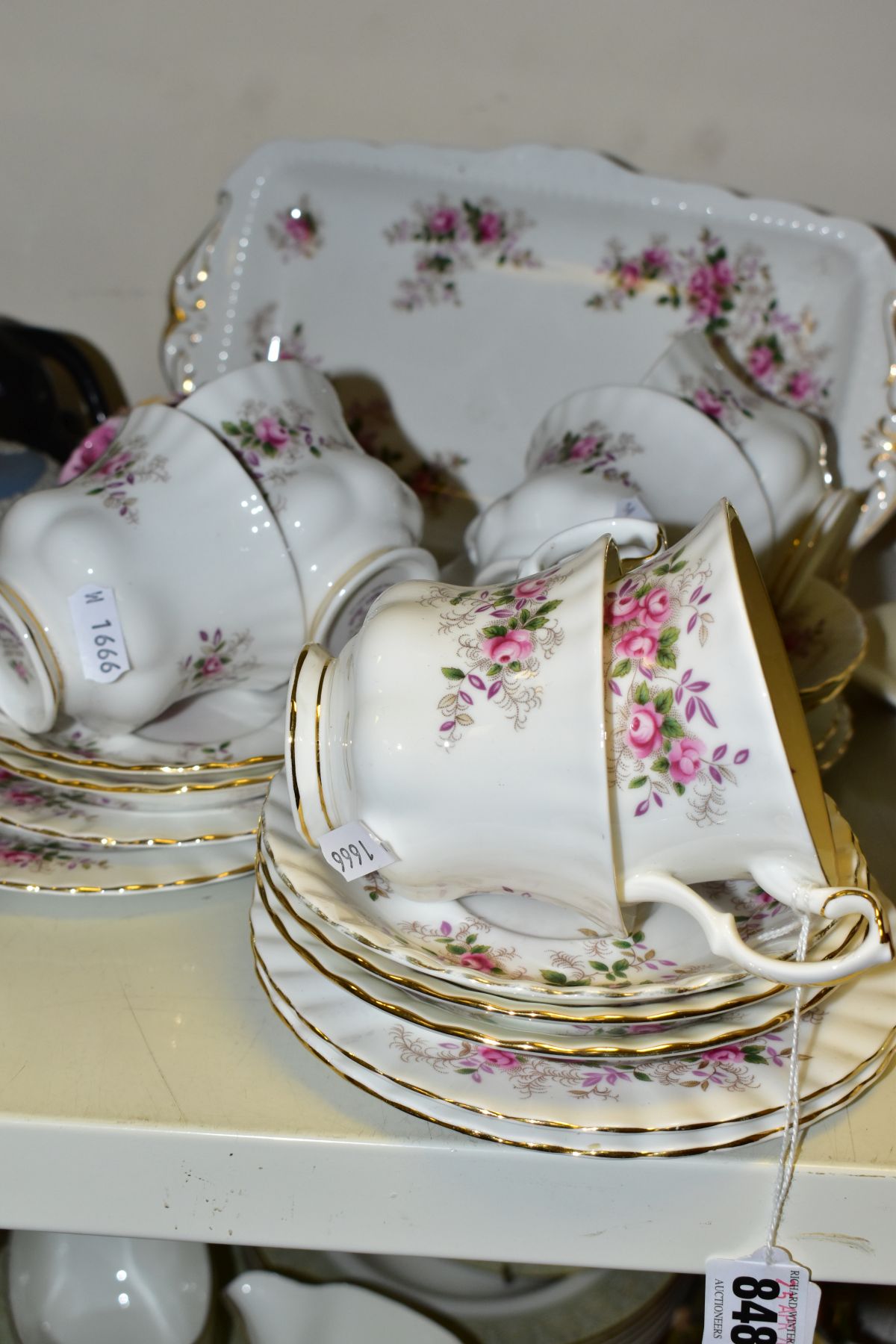 A TWENTY PIECE ROYAL ALBERT LAVENDER ROSE TEA SET, comprising a sandwich plate, six tea cups,