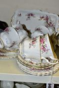 A TWENTY PIECE ROYAL ALBERT LAVENDER ROSE TEA SET, comprising a sandwich plate, six tea cups,