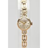 A LADIES 9CT GOLD 'AVIA' WRISTWATCH, movement requires some attention, round silver dial signed '