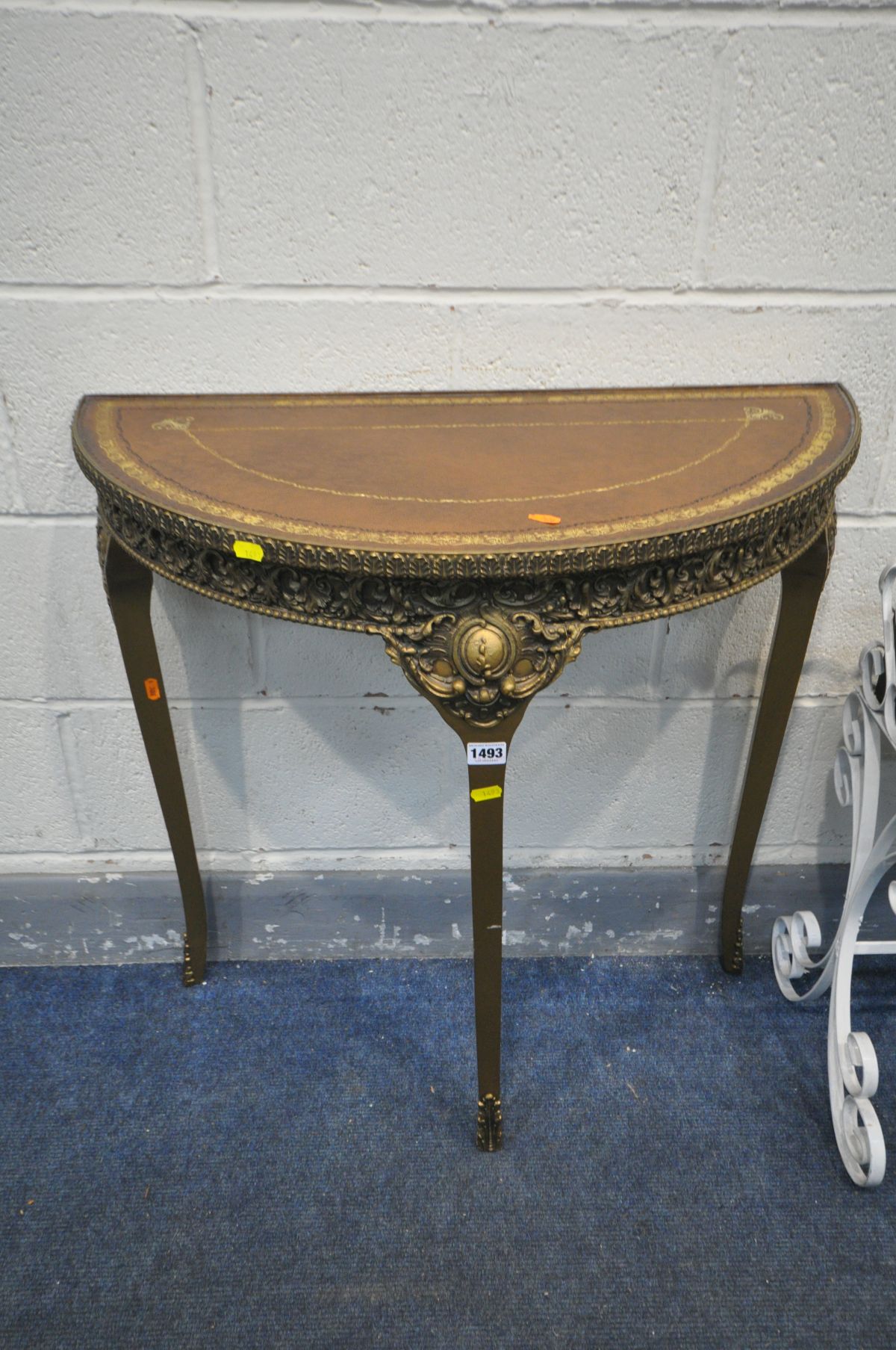 A GILT FRENCH DEMI LUNE HALL TABLE, a wrought iron planter and a metal magazine rack (3) - Image 3 of 3