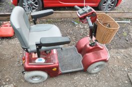 A SHOPRIDER TE-889NR MOBILITY SCOOTER with power supply (PAT pass and working)