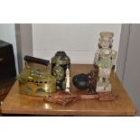 A GROUP OF INTERNATIONAL WOODEN AND METAL ITEMS, comprising a carved wooden figure of a man height