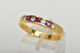 A RUBY AND DIAMOND HALF HOOP RING, yellow metal band, designed with a row of three channel set