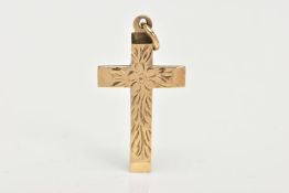 A 9CT GOLD CROSS PENDANT, floral detailing to the front with a plain polished reverse, hallmarked