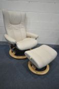 AN EKORNES STRESSLESS CREAM LEATHER RECLINING SWIVEL ARMCHAIR, and a matching pouffe (in nearly
