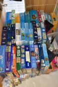 A QUANTITY OF BOXED JIGSAW PUZZLES, approximately sixty to seventy puzzles by manufacturers