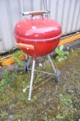 A WEBER DOMED BARBECUE on stand and an aluminium step ladder (2)