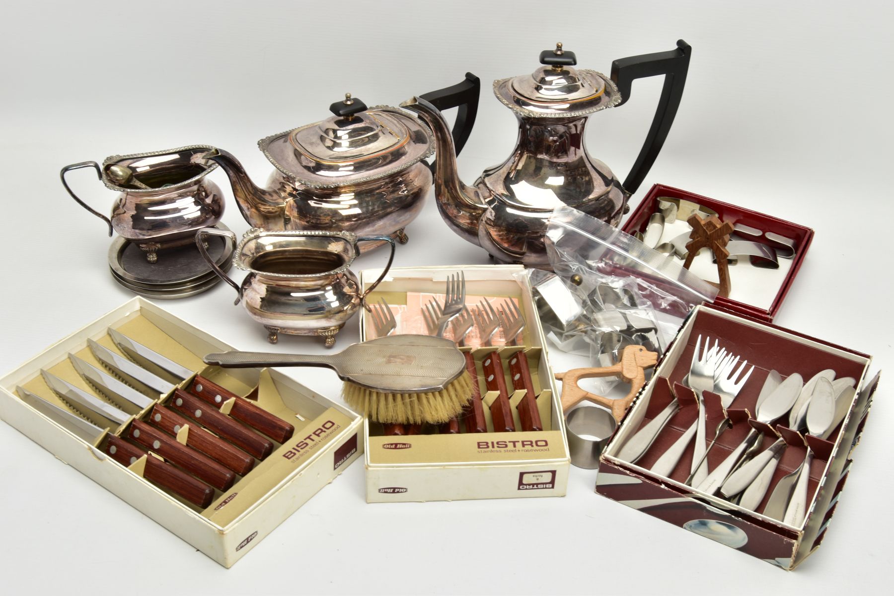 A BOX OF ASSORTED STAINLESS STEEL AND PLATED TABLEWARE, to include six signed 'Robert Welch'