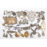 A BAG OF ASSORTED SILVER AND WHITE METAL ITEMS, to include a silver decanter label for 'Whiskey'