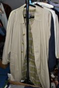 A GENTS BURBURRY KHAKI MAC AND TWO AQUASCUTUM COATS, the Burberry mac with green tartan interior,