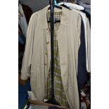 A GENTS BURBURRY KHAKI MAC AND TWO AQUASCUTUM COATS, the Burberry mac with green tartan interior,