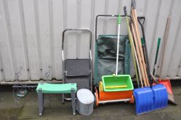 A SELECTION OF GARDEN TOOLS including a lawn sweeper, a lawn seeder, a set of steps etc