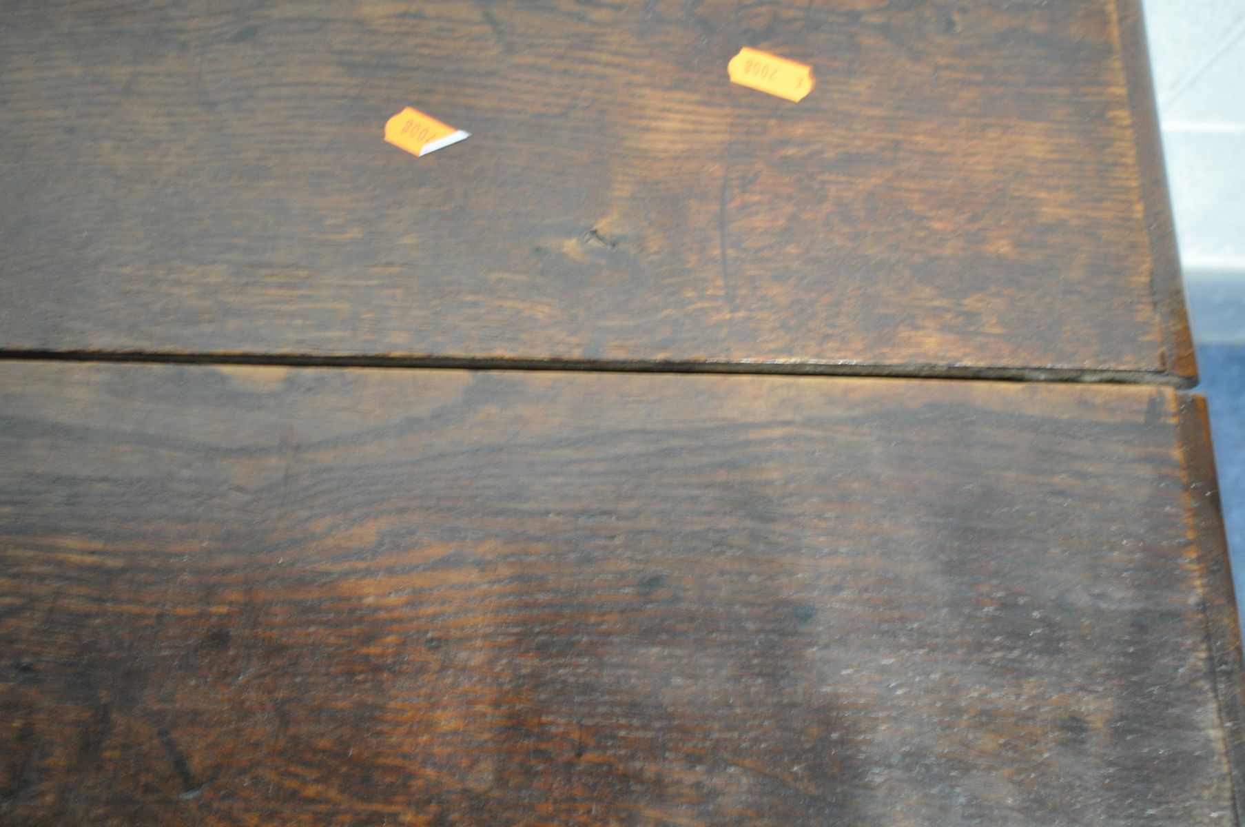 AN 18TH CENTURY OAK MULE CHEST, the hinged plank top enclosing a candle box, and panelled front - Image 3 of 5