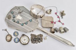 A SELECTION OF SILVER AND WHITE METAL ITEMS, to include a silver vanity mirror decorated with an