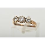A 9CT GOLD THREE STONE RING, set with three circular cut cubic zirconia, each in a claw setting,