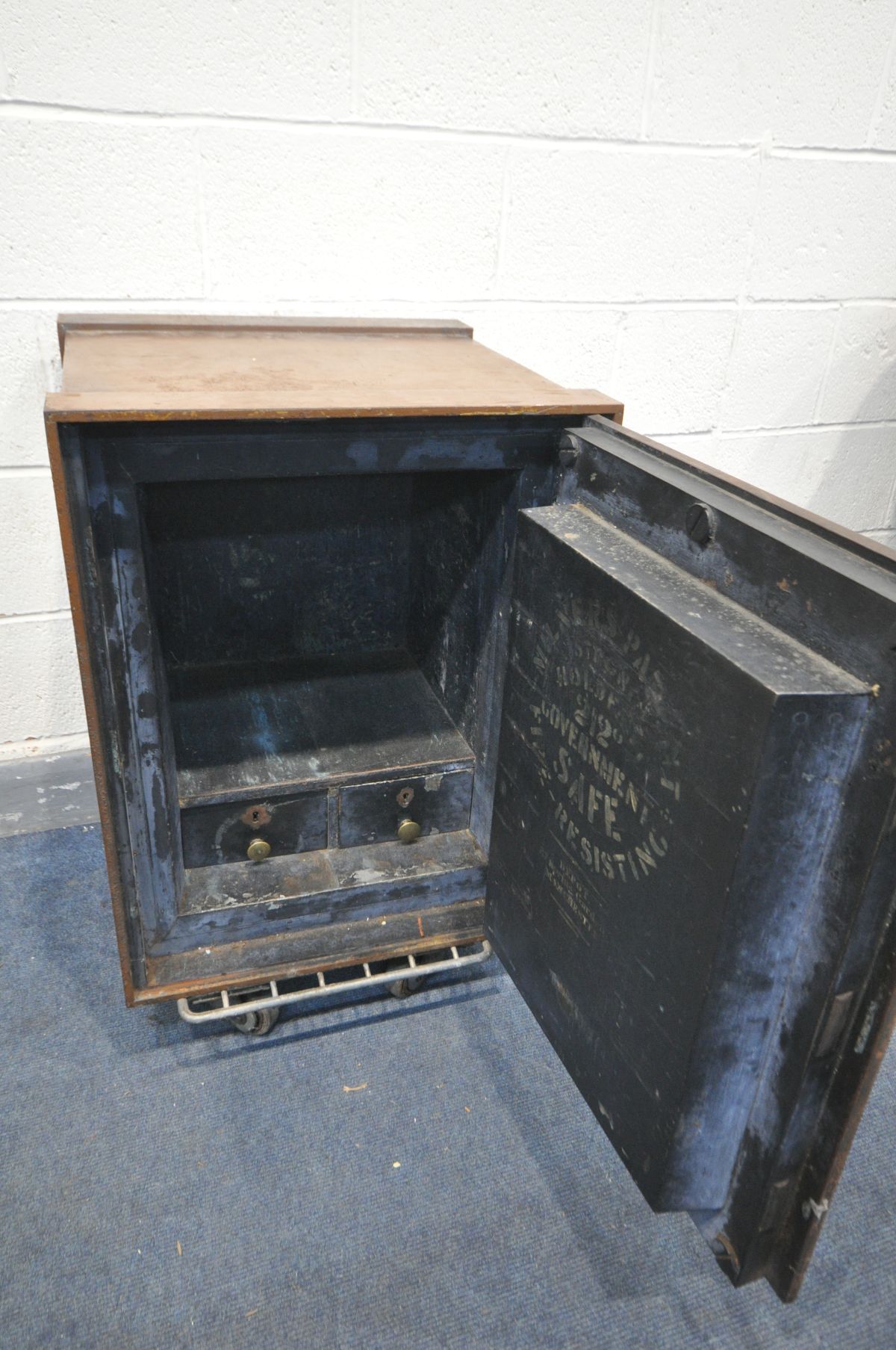 A 19TH CENTURY CAST IRON SAFE, made by Milner's Patent, later partially brown overpainted, brass - Image 4 of 6