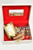 A CREAM JEWLLERY BOX WITH CONTENTS AND A CARRIAGE CLOCK, cream jewellery box opens to reveal a small