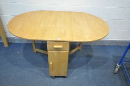 A BEECH GATE LEG KITCHEN TABLE