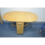 A BEECH GATE LEG KITCHEN TABLE