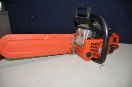 A DOLMAR CHAINSAW model No 115i (engine pulling freely) along with an Outdoor revolution tent (