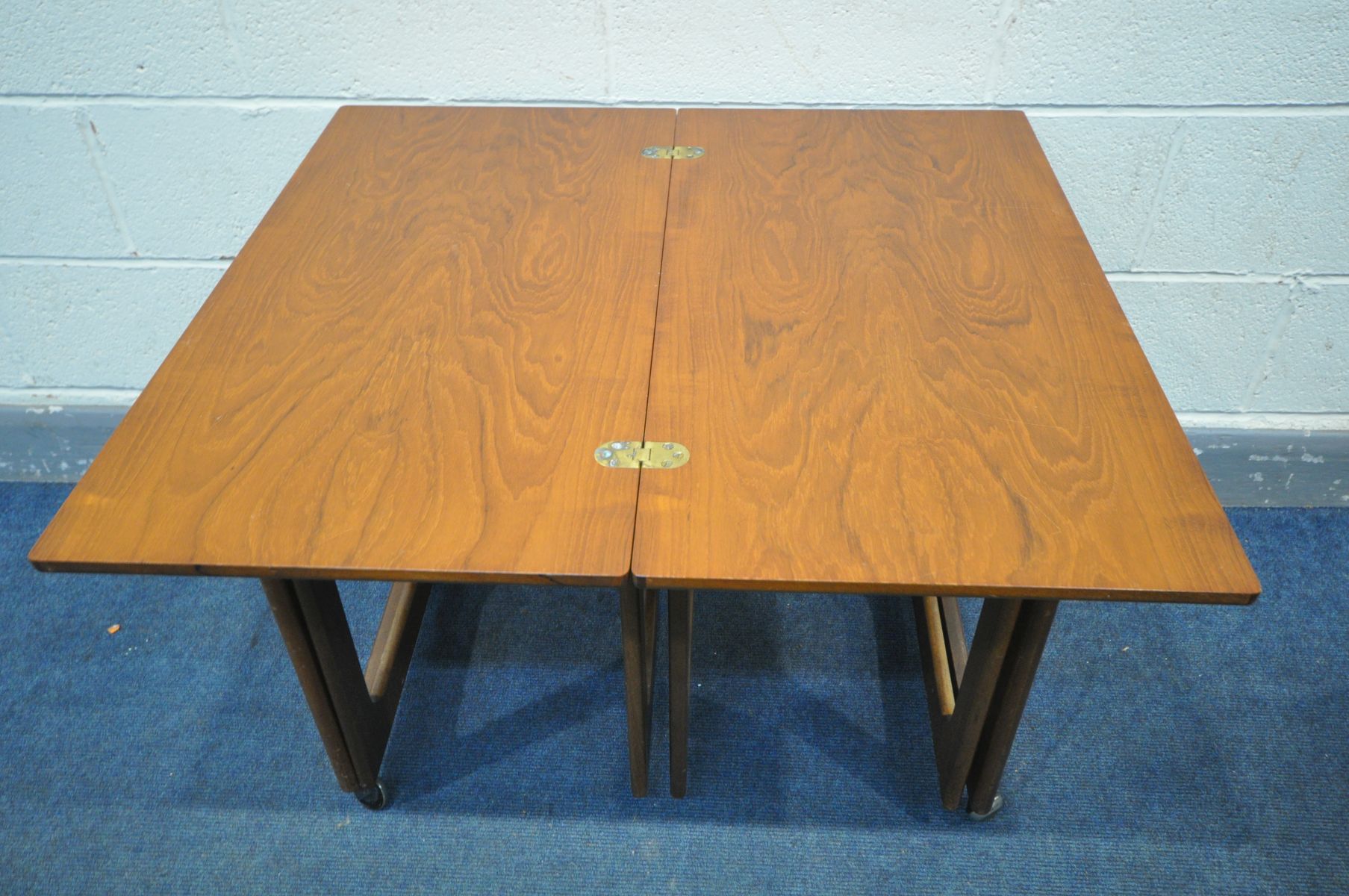 A MCINTOSH TRIFORM TEAK NEST OF THREE TABLES, with a fold over top, width 76cm x depth 41cm x height - Image 3 of 3