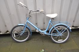 A B.S.A. FOLDING BIKE with 20in wheels, a Brookes saddle and rear rack