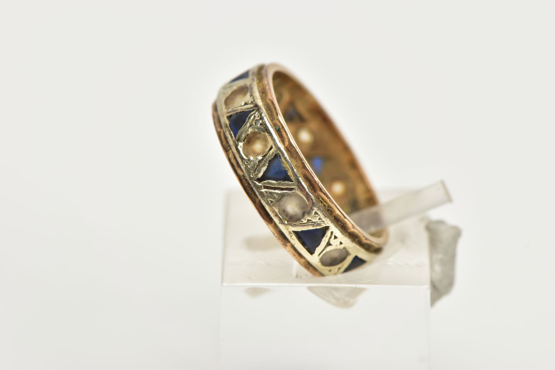 A 9CT GOLD FULL ETERNITY RING, set with blue triangular cut paste and colourless circular cut - Image 2 of 4