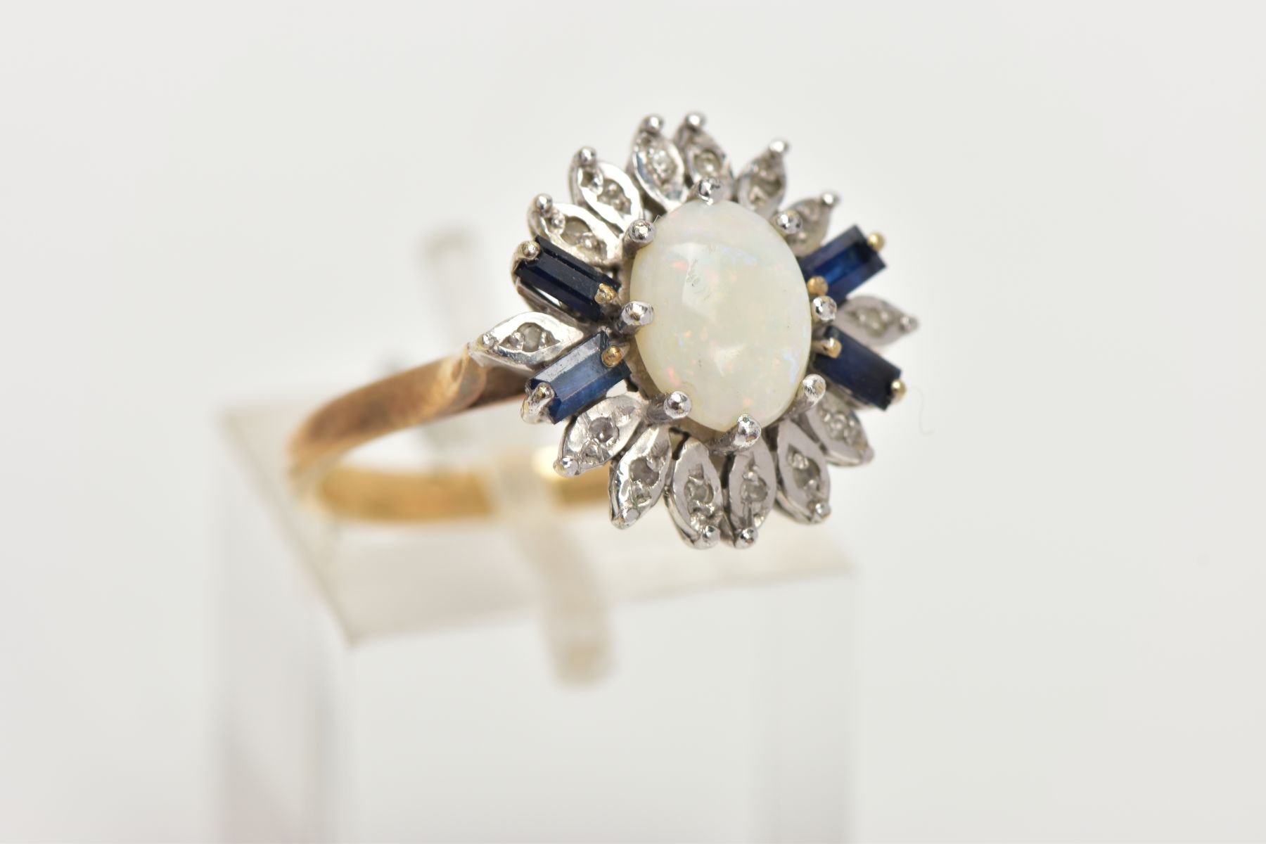 A 9CT GOLD OPAL CLUSTER RING, designed with a central oval cut opal cabochon, flanked with four - Image 4 of 4