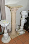 THREE DECORATIVE PEDESTALS, comprising two carved alabaster examples, heights 59cm and 72cm, on