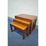 A DANISH 1960'S/70'S ROSEWOOD NEST OF THREE TABLES, unlabelled, largest table width 62cm x depth