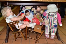 A BOX AND LOOSE DOLLS AND A DOLL'S HIGH CHAIR, to include twelve plastic, composition, bisque and