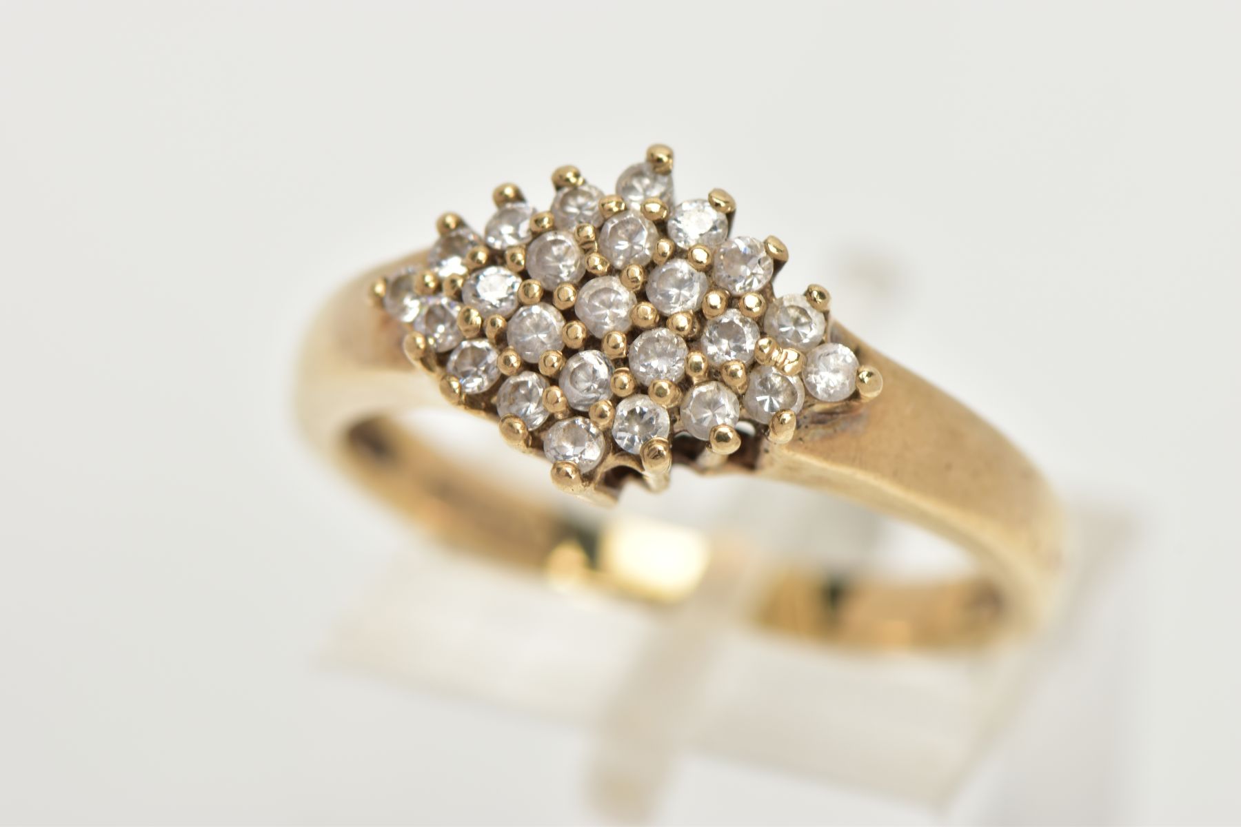 A 9CT GOLD CUBIC ZIRCONIA RING, of a lozenge shape set with a cluster of colourless cubic zirconia - Image 2 of 6