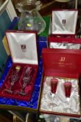 FIVE BOXED SETS OF DRINKING GLASSES AND A BOXED DARTINGTON CRYSTAL 'BOUQUET VASE IN THE