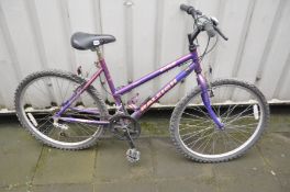 A RALEIGH ZING LADIES MOUNTAIN BIKE with 10 speed Shimano gears and 18in frame