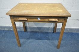 AN OAK DESK with a single drawer, width 91cm x depth 61cm x height 77cm