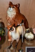 THREE BESWICK CATS AND A ROYAL DOULTON CAT, comprising Royal Doulton Siamese Cat - standing, style