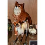 THREE BESWICK CATS AND A ROYAL DOULTON CAT, comprising Royal Doulton Siamese Cat - standing, style