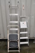 TWO SETS OF ALUMINIUM STEP LADDERS and a set of metal steps