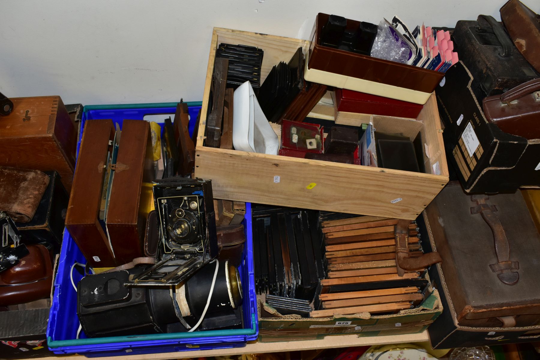 SEVEN BOXES OF ANTIQUE AND VINTAGE CAMERAS, to include a Zeiss Ikon sheet film camera with Compur