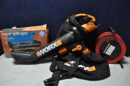 A WORX LEAF BLOWER with bag and carrying strap (PAT pass and working) along with a 50m extension
