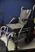 A KARMA S-ERGO115 WHEELCHAIR folding push along wheelchair in good used condition along with a Drive