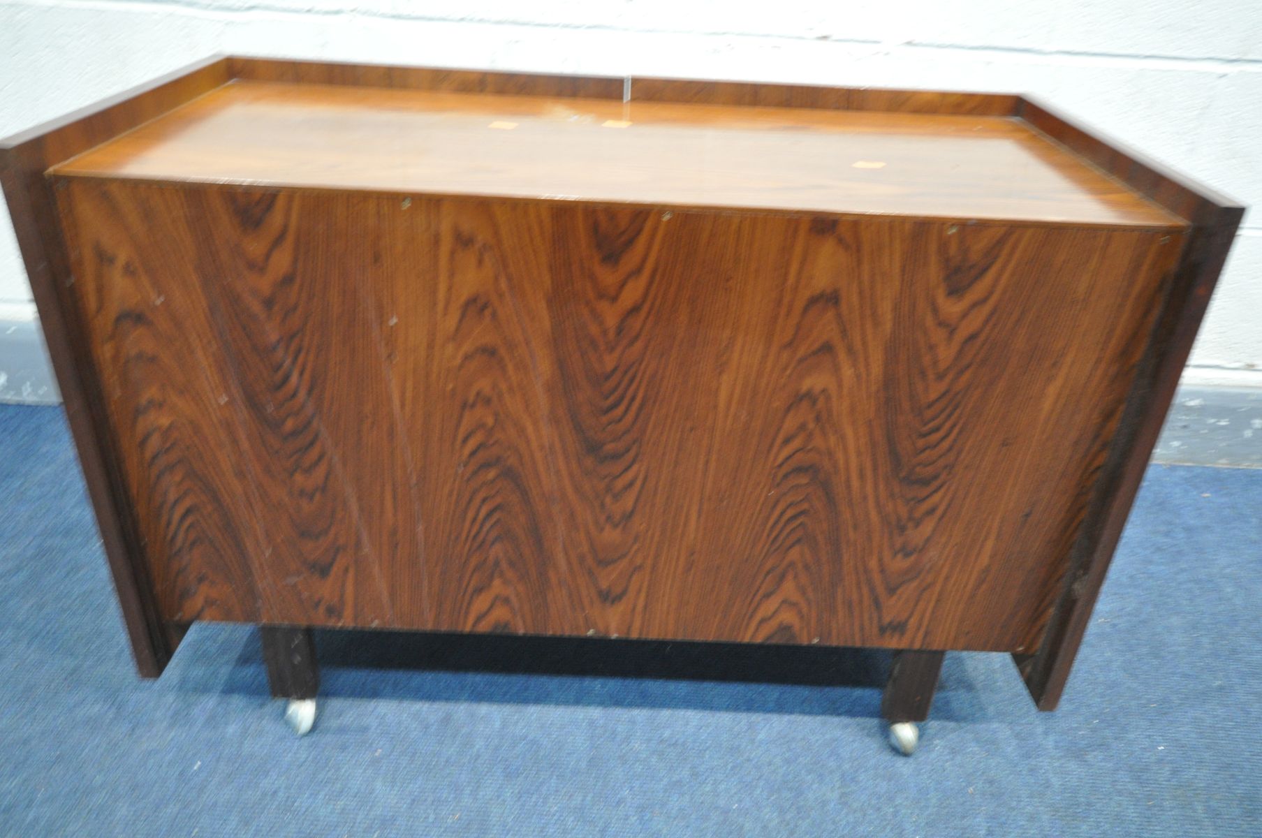 A DANISH 1960'S/70'S ROSEWOOD ROLLING TWO DOOR CABINET, unlabelled, width 91cm x depth 44cm x height - Image 3 of 4