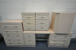 A FIVE PIECE CREAM BEDROOM SUITE, comprising of a chest of five drawers, a pair of three drawer