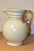 A CLARICE CLIFF NEWPORT POTTERY JUG, SHAPE NO.895 MY GARDEN, cream glaze with Autumnal coloured