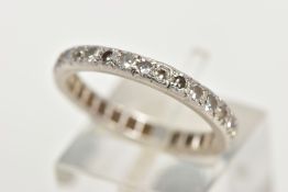 A DIAMOND FULL ETERNITY RING, twenty nine single cut diamonds and one old cut diamond grain set in a