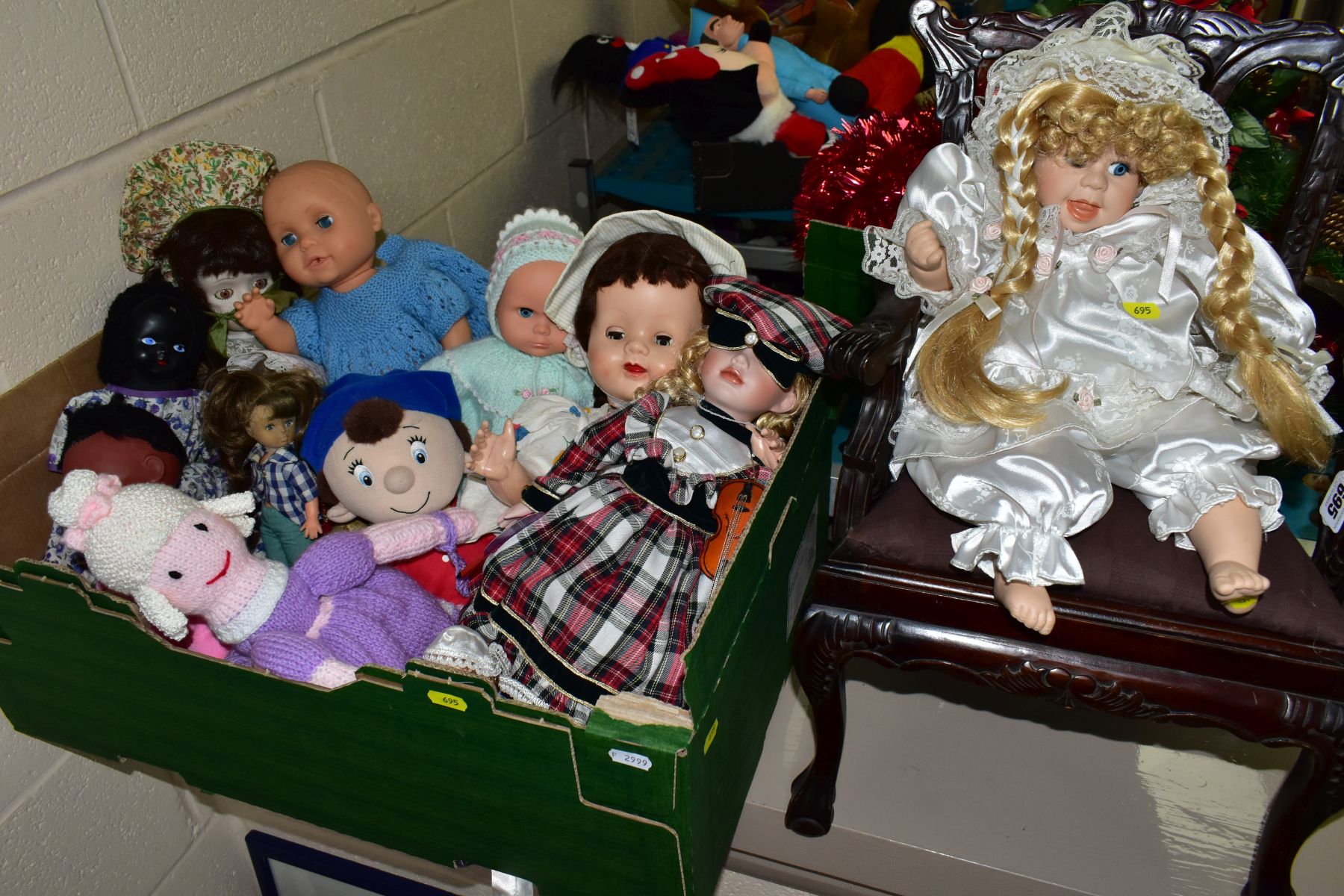 A BOX OF ASSORTED DOLLS AND A REPRODUCTION MAHOGANY STAINED CHIPPENDALE STYLE DOLL'S CHAIR, height
