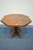 A RECLAIMED OAK OCTAGONAL OCCASIONAL TABLE, on a cruciform base, 79cm squared x height 60cm