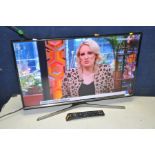 A SAMSUNG 32in SMART TV with remote model No UE32J5600AK (PAT pass and working)